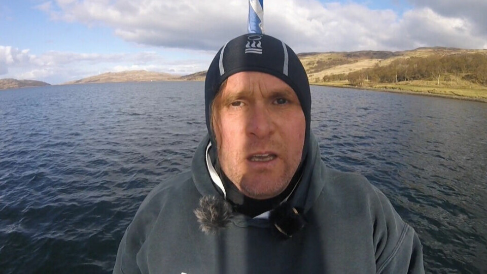 Anti-salmon farming activist Don Staniford on his way to film fish in a pen at a Scottish Sea Farms site at Loch Spelve, Mull. Image taken from video by Don Staniford.