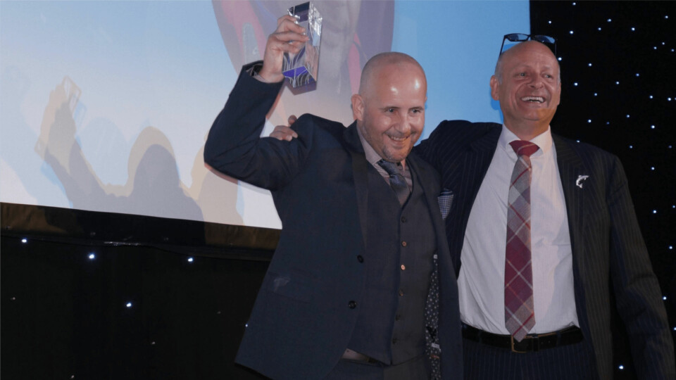 Scottish Sea Farms' Orkney production manager Richard Darbyshire, left, is presented with the People's Choice award by Campbell Morrison of category sponsor STIM (formerly Europharma), at last year's awards. Photo: Gareth Moore / FFE.