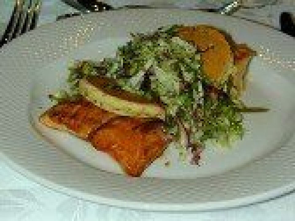 A study has linked eating fish such as salmon with a reduction in the symptoms of rheumatoid arthritis.