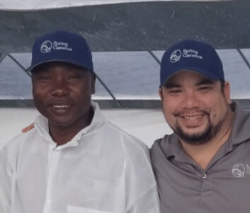 Alfred Kadzomba, left, with Hideyoshi Segovia during a visit to Spring Genetics' facility in Miami last year. Photo: Spring Genetics. Alfred Kadzomba, left, with Hideyoshi Segovia during a visit to Spring Genetics' facility in Miami last year. Photo: Spring Genetics.