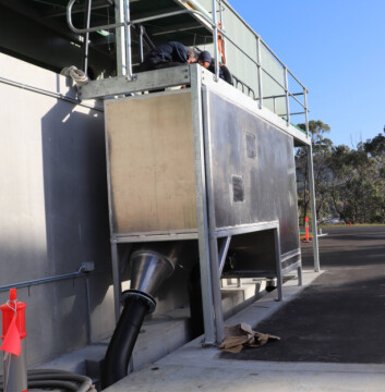 After the fish leave the nursery in the clear pipe (see picture above) they are funneled into the pipe that runs underground and then along the wharf. Photo: Huon. After the fish leave the nursery in the clear pipe (see picture above) they are funneled into the pipe that runs underground and then along the wharf. Photo: Huon.