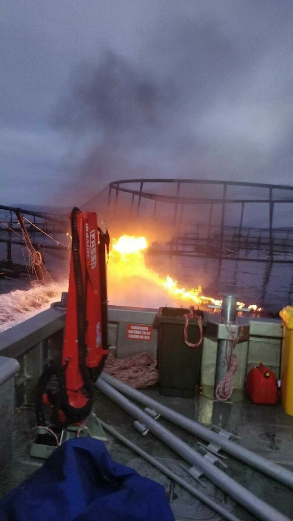 This fire on the pen allowed around 50,000 salmon to escape. Photo: Huon Aquaculture.