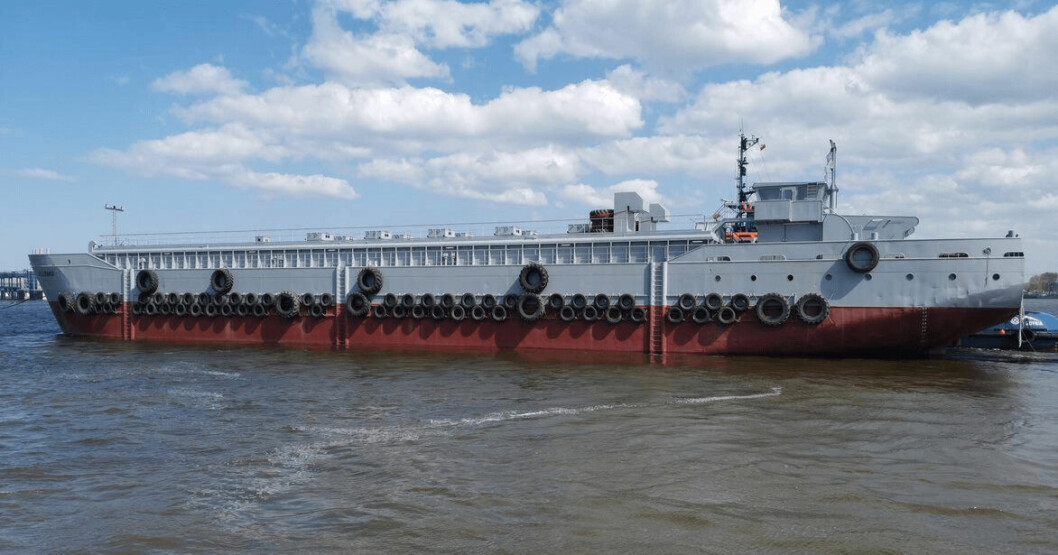 JT electric recently delivered this 850-tonne capacity barge, converted from a bulk carrier, to Faroes salmon farmer Hidden Fjord but aims to supply smaller, new-build barges in Scotland and Norway. Photo: JT electric.