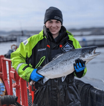 Mowi's Cameron Tallach with one of the organic salmon grown in Loch Ewe. Photo: Mowi.