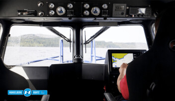 The boat's dashboard features full GMDSS communication system, radar and chart plotter. Click on image to enlarge. Photo: Hukkelberg.