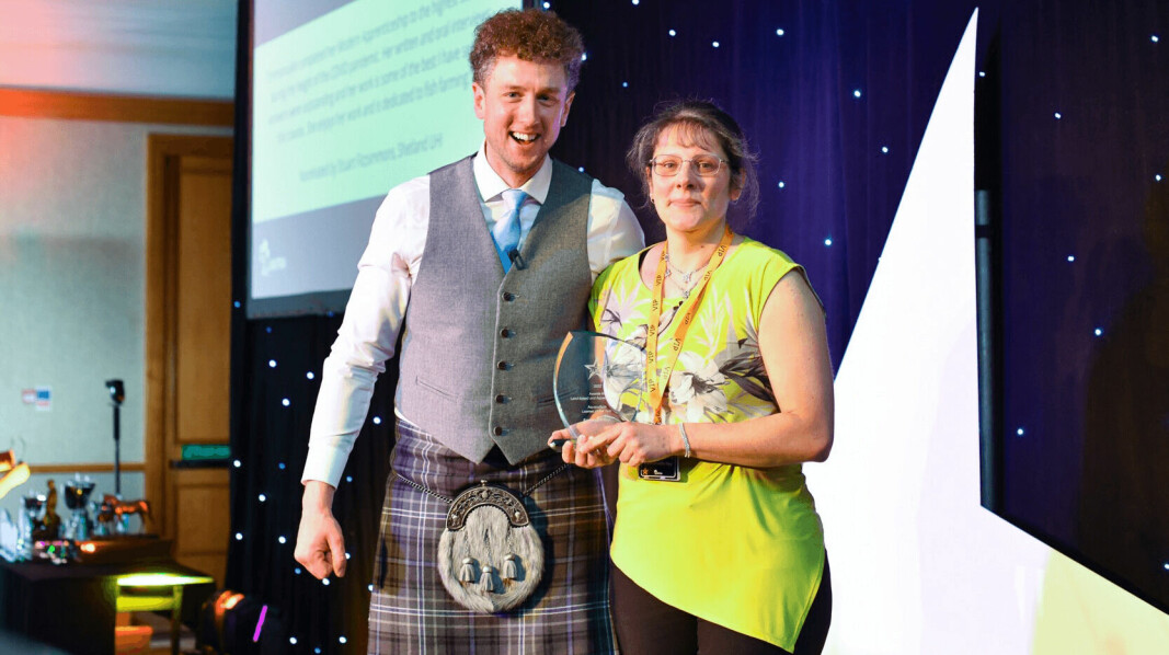 Sheep farming social media personality Cammy Wilson presents Dawnfresh Farming employee Emmanuelle Rey with the Aquaculture Learner of the Year trophy at Lantra Scotland’s ALBAS ceremony in March.