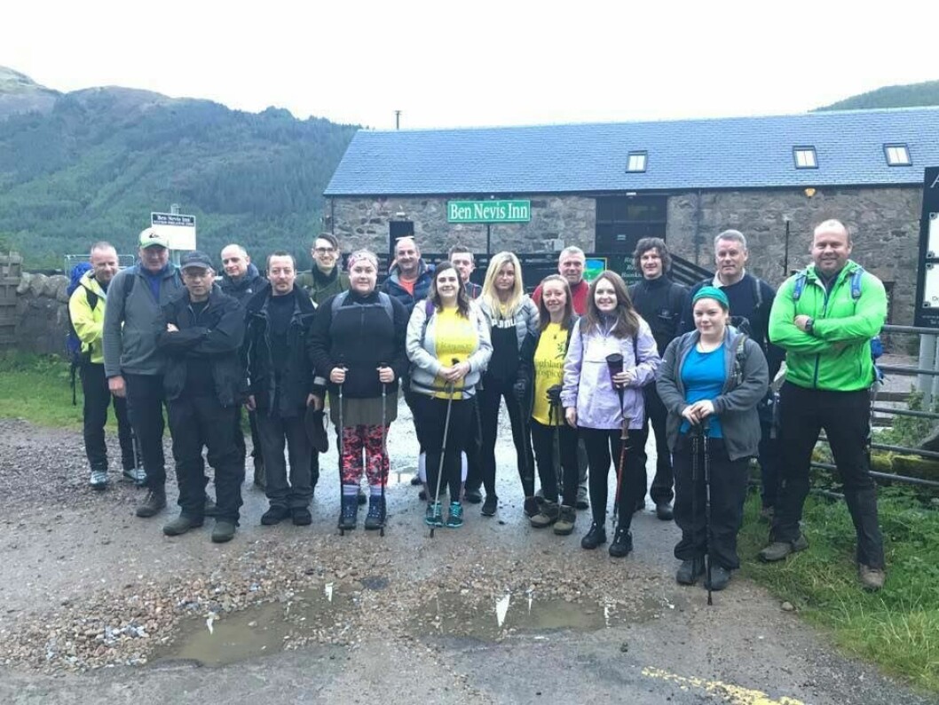 Summit to be proud of: Employees of Marine Harvest walked up Britain's highest mountain to raise money for the Highland Hospice. Photo: Marine Harvest