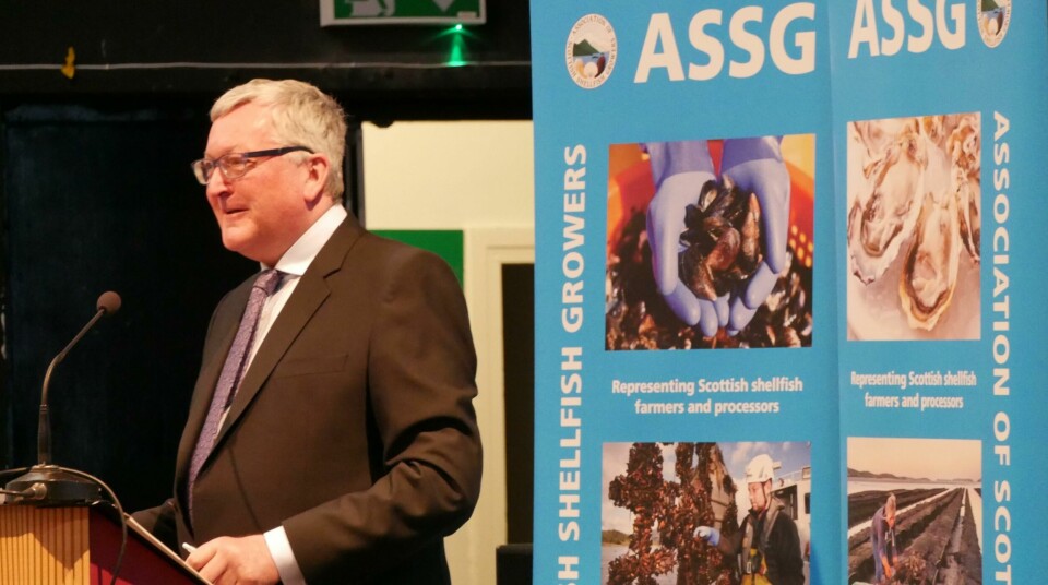 Cabinet Secretary for the Rural Economy and Connectivity Fergus Ewing speaks at the ASSG conference in Oban. Photo: Fish Farming Expert.