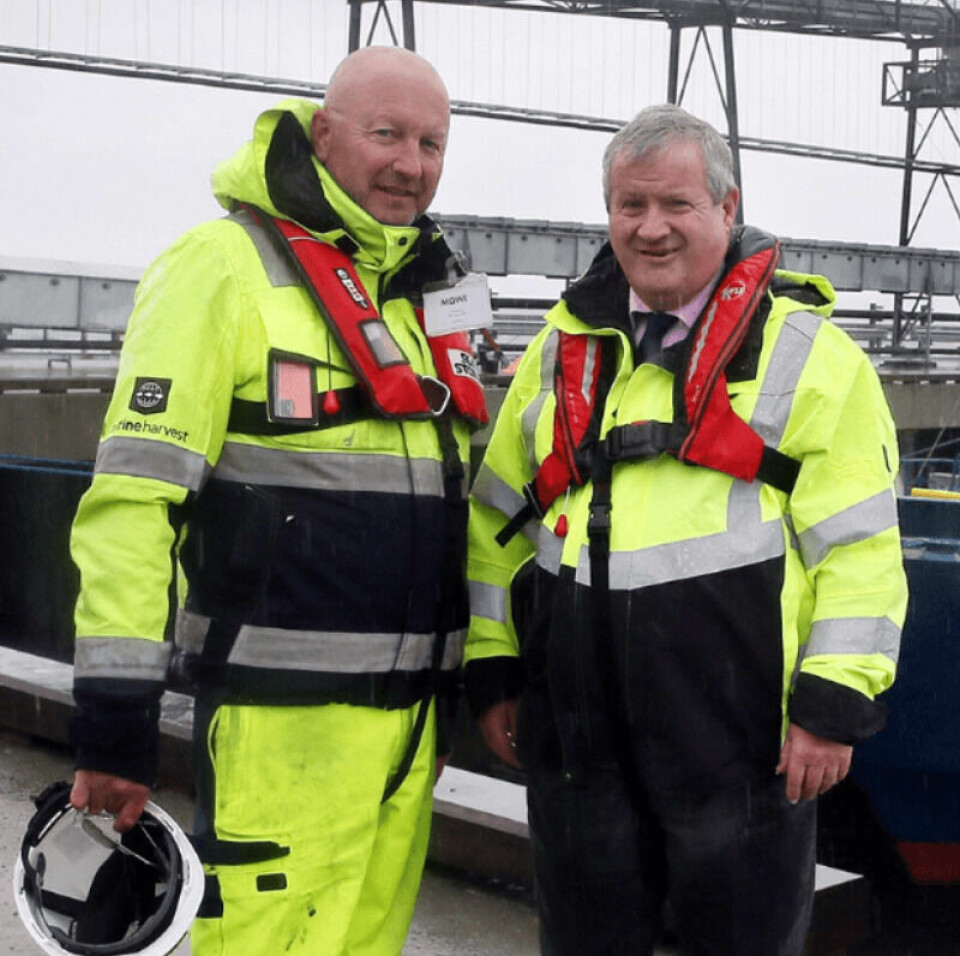 Mick Watts, Mowi’s project director and global engineer, left, with local MP Ian Blackford, who officially opened the pier at the feed plant last week. Photo: Mowi.