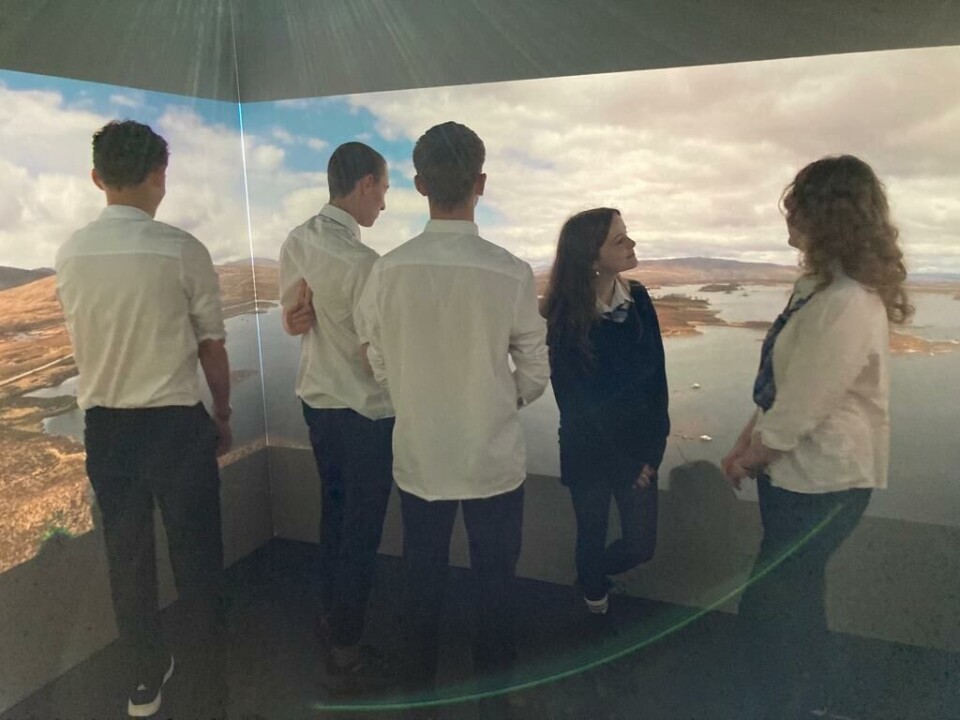 Pupils at Lochgilphead Joint Campus look at one of the portable exhibits erected at the event. Photo: Salmon Scotland.