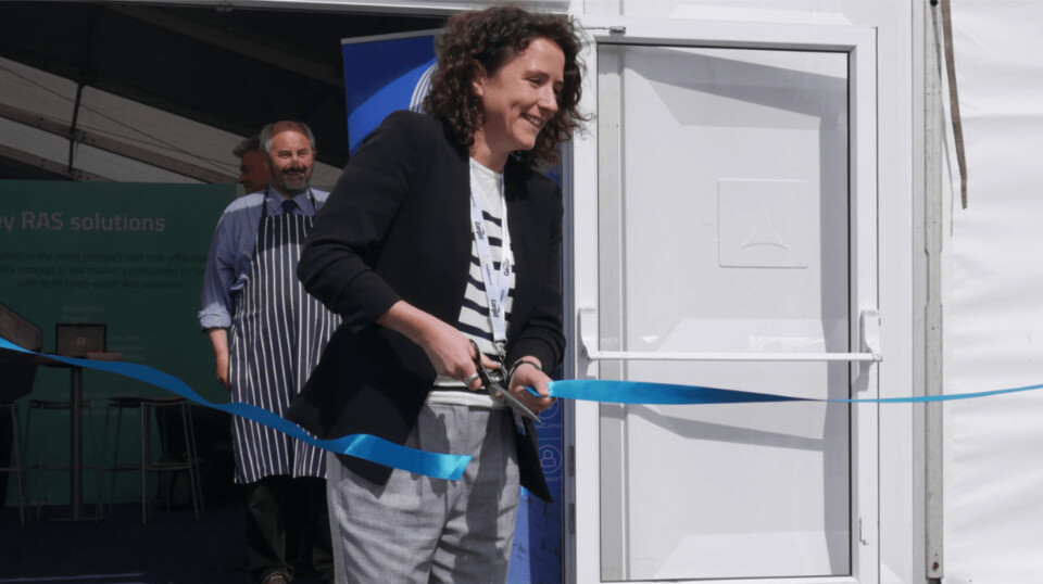 Scotland's Rural Affairs Secretary Mairi Gougeon cuts a ribbon to open Aquaculture UK at Aviemore last year. Inset: the new reporting setting out the claimed benefits of Scottish independence to the sector.
