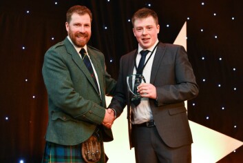Billy Welsh receives his runner-up award from Jim Smith. Click on photo to enlarge. Photo: Lantra Scotland.