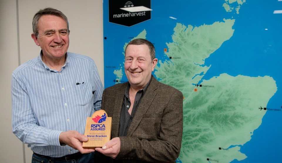Steve Bracken, left, receives his award from RSPCA Assured aquaculture manager Malcolm Johnstone. Photo: Abrightside Photography