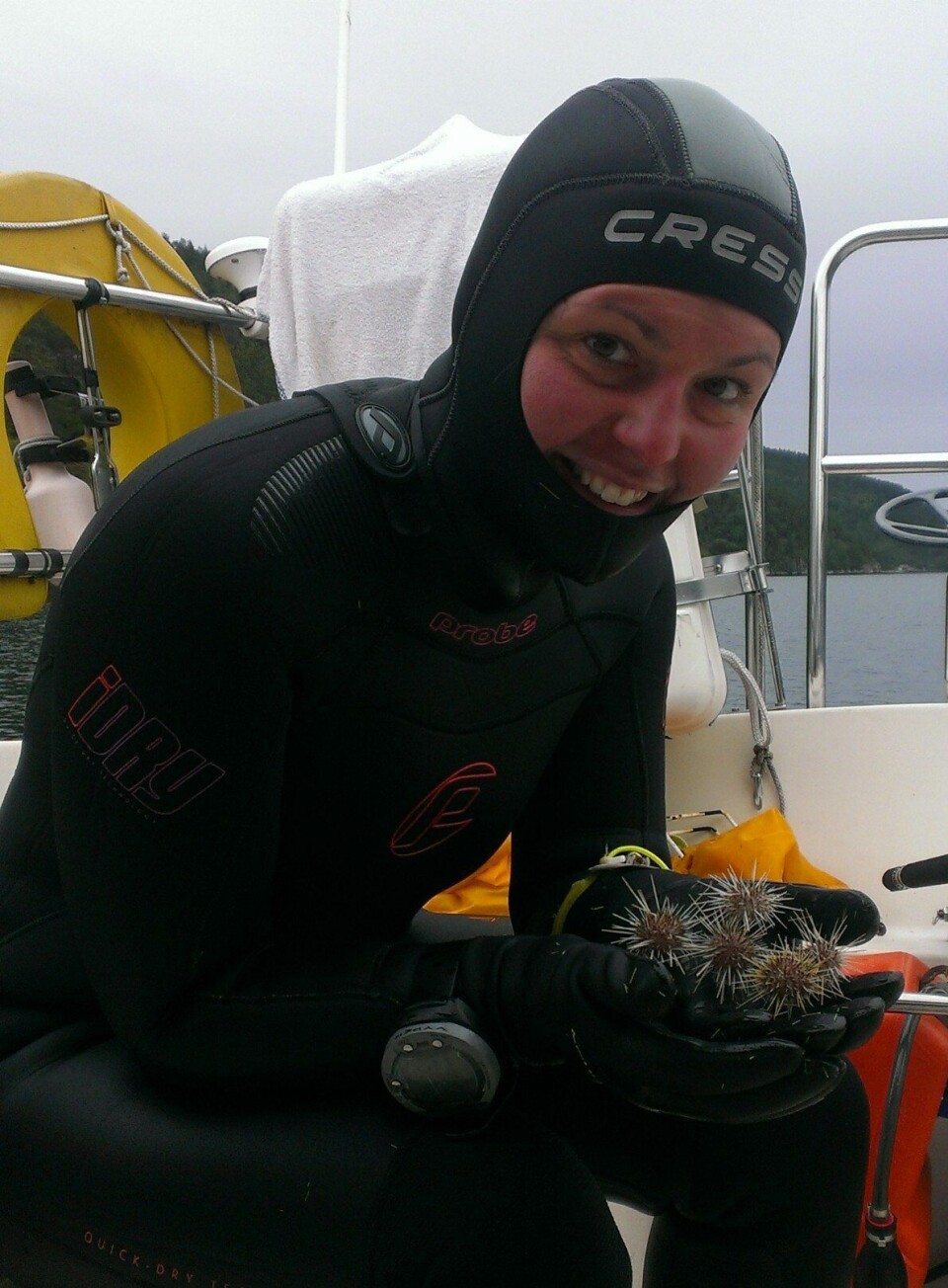 Camille White with urchins gathered from a fjord.
