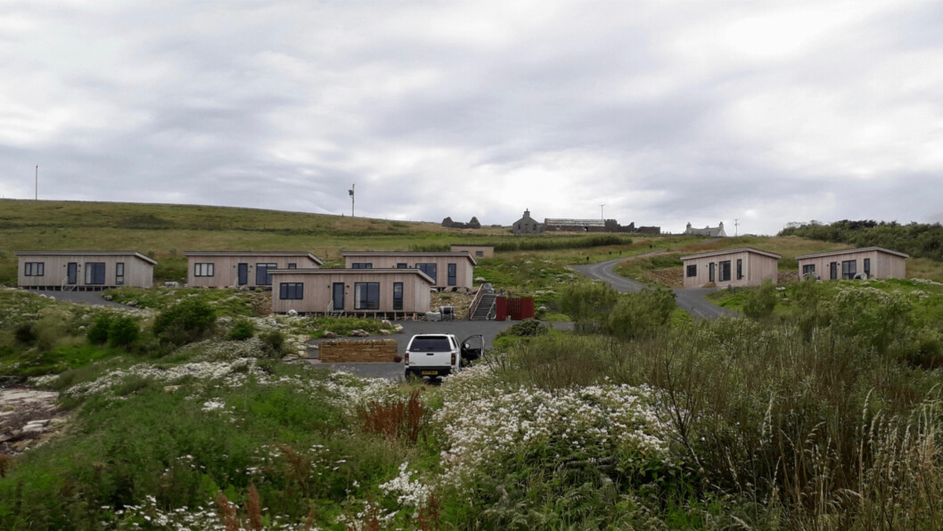 The four lodges for the salmon farm workers, left, and the two extra lodges on the right. Photo: SSF.