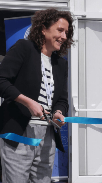 Mairi Gougeon cuts the ribbon to open Aquaculture UK. Photo: FFE. Mairi Gougeon cuts the ribbon to open Aquaculture UK. Photo: FFE.
