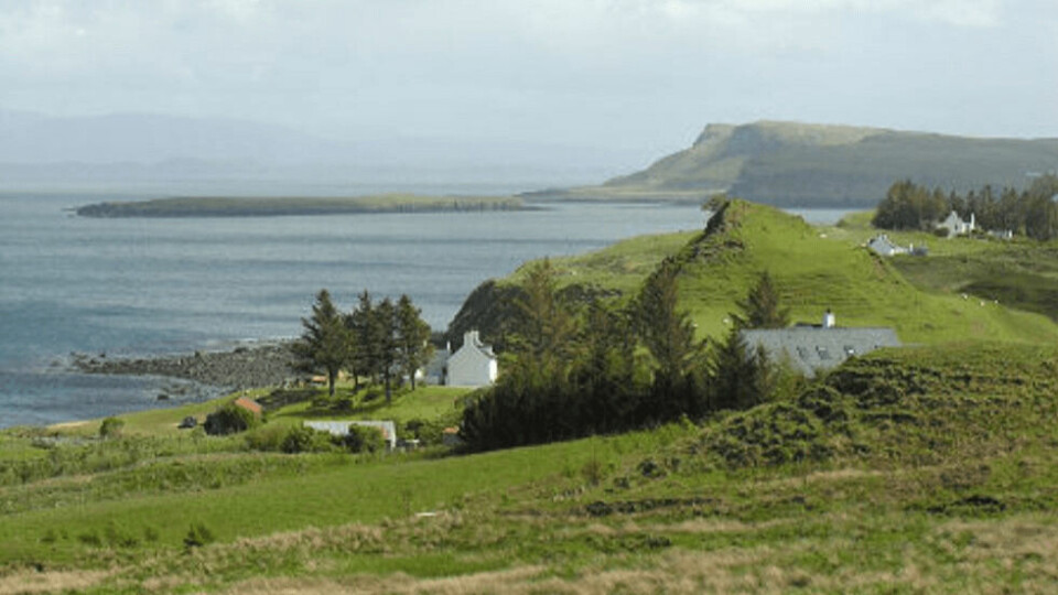 The view south from Flodigarry towards Staffin, where OSH now has two salmon farm sites. A government appointed planning reporter has rejected an appeal against Highland Council's decision to refuse permission for a farm off Flodigarry. Photo: Undiscovered Scotland.
