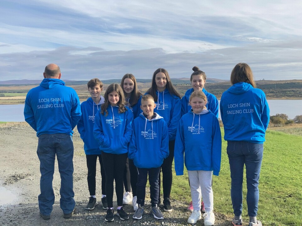 Some of Loch Shin Sailing Club's members wearing their hoodies. Click on image to enlarge. Photo: Cooke.