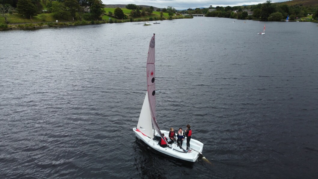 Young members of Loch Shin Sailing Club in one of the Bahia sail boats paid for by Cooke Aquaculture Scotland. Photo: Cooke.