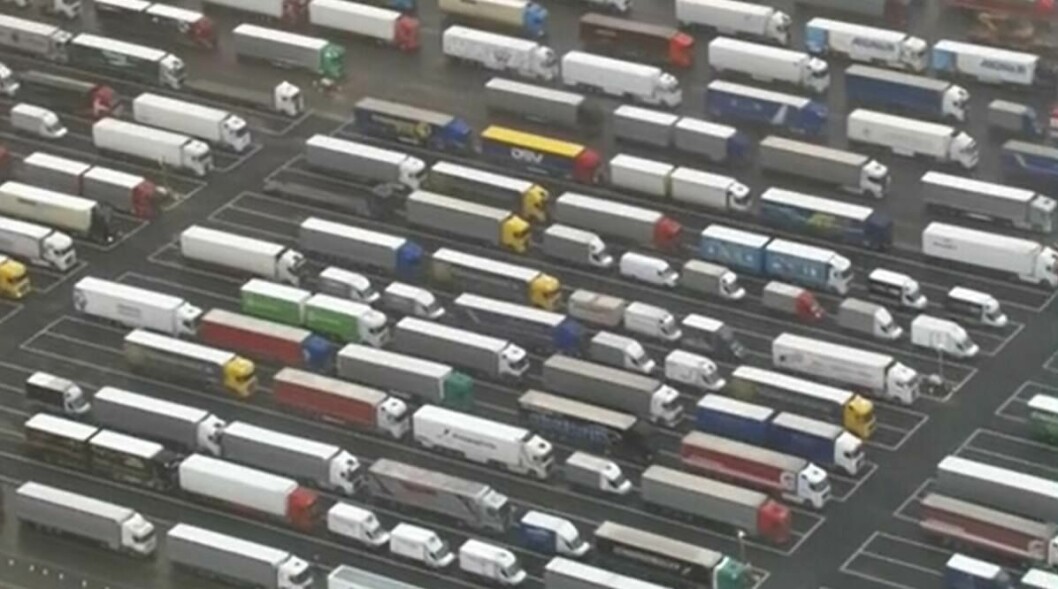 Just a fraction of the 3,000 or more lorries waiting at Manston Airport in Kent to cross to France. Photo: BBC.