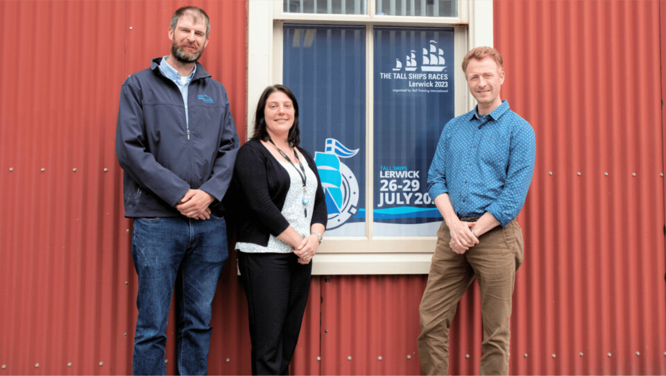 From left: David Brown, Cooke Aquaculture Scotland’s Shetland regional manager; Emma Miller, Shetland Tall Ships project manager; Grant Cumming, Scottish Sea Farms operations manager. Photo: Lakota Clubb.