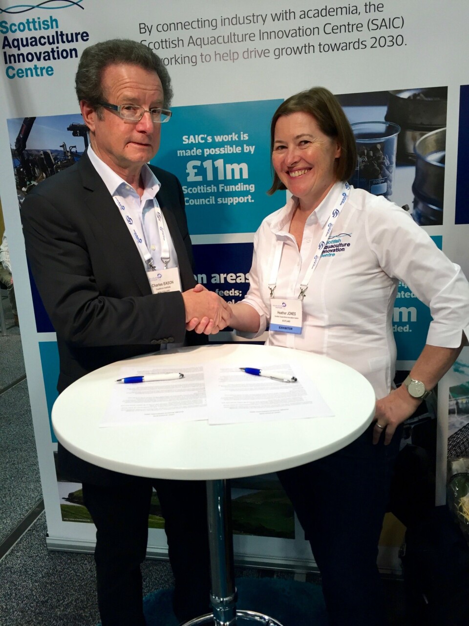 SAIC's CEO, Heather Jones, and Cawthron's Chief Executive, Professor Charles Eason, signed the Letter of Intent at AE2016. Image: SAIC.