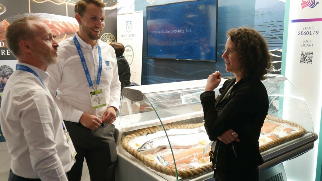 Loch Duart Salmon sales director Chris Orr and marketing and communications manager Adam Gray chat with Rural Affairs Secretary Mairi Gougeon in Barcelona on Tuesday. Photo: FFE.