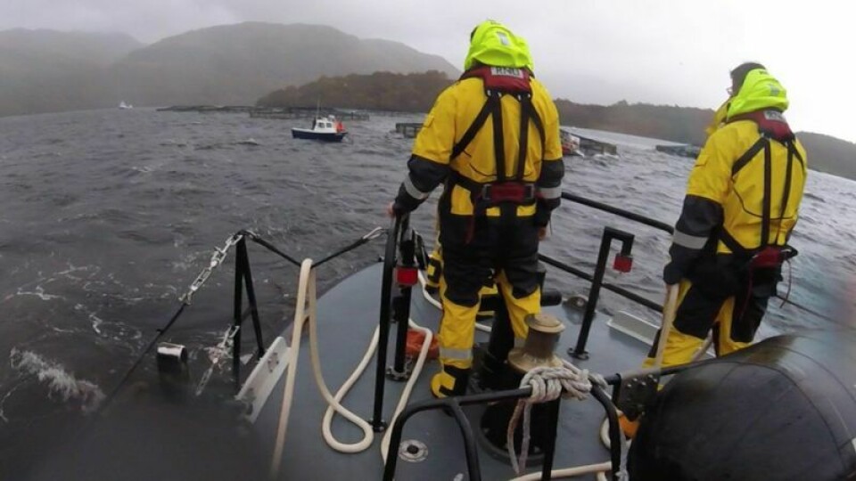 The RNLI lifeboat from Oban rescues a fishing boat crew who were able to attach their boat to a fish farm mooring during rough weather at the weekend. Click on image to enlarge. Photo: RNLI Oban.