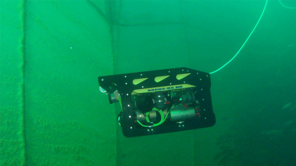 The Artifex ROV during trials. The Nortek DVL transducer windows are visible bottom left, facing the net. Photo: SINTEF Ocean AS.