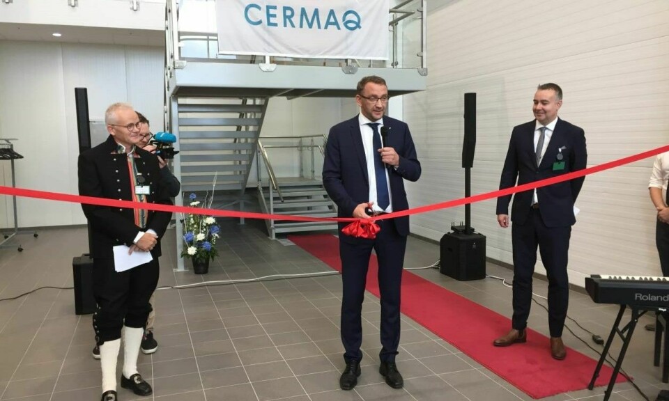 Norwegian Secretary of State Roy Angelvik cuts the ribbon to open the processing plant in the north of the country. Photo: Cermaq