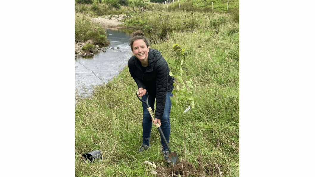 Scotland's Rural Affairs Secretary Mairi Gougeon planting a tree to help shade a salmon river in Angus. Photo: Scottish Government.