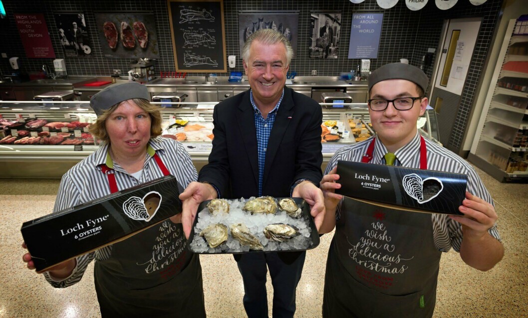 Loch Fyne Oysters sales director Simon Briggs, centre, with Waitrose counter staff Cate Lee and Tom Sparks. Photo: Loch Fyne Oysters Loch Fyne Oysters sales director Simon Briggs, centre, with Waitrose counter staff Cate Lee and Tom Sparks. Photo: Loch Fyne Oysters