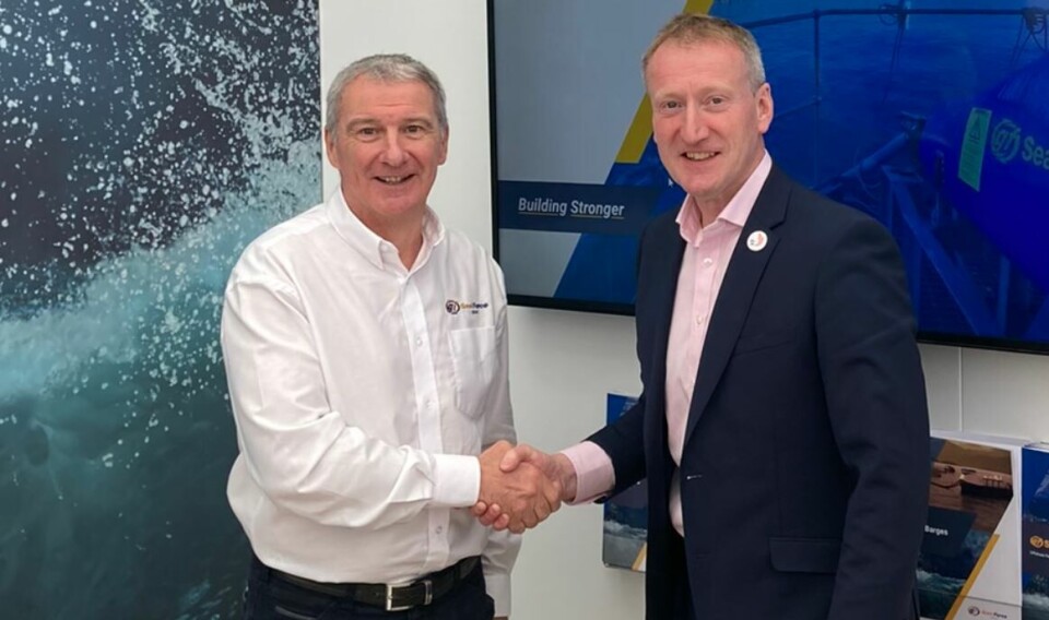 Stewart Graham pictured with Salmon Scotland chief executive Tavish Scott, right.