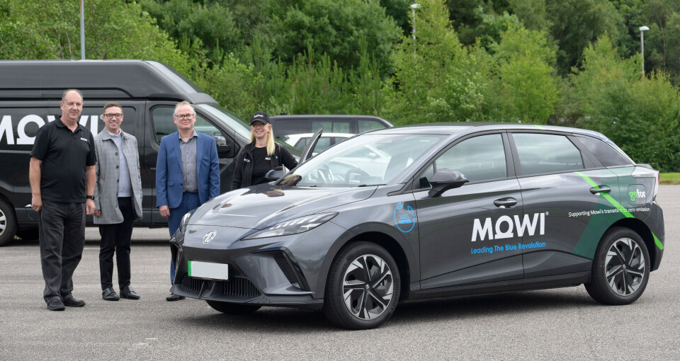 From left: Mowi purchasing manager Ian Barrett, Allan Dennis and Justin Blackie from Gofor, and Mowi purchasing assistant Rebecca Bashir with an MG electric car at Mowi’s Fort William office.