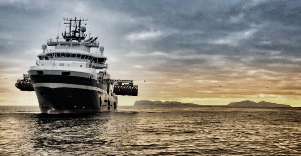A picture of Ava Ocean's vessel, Arctic Pearl, showing its non-invasive harvesting equipment suspended on booms on each side of the ship. The equipment is lowered to the seabed on cables.