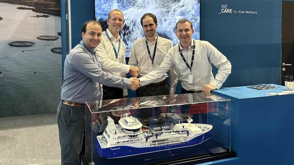 Representatives of Intership and Multi X shake in the deal at Intership's stand at the Aqua Nor trade show currently taking place in Trondehim, Norway.
