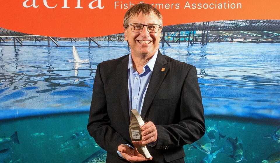 Steven Backman receives his award from ACFFA.