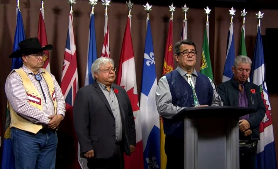 Bob Chamberlin, speaking, and other members of the BC First Nations Wild Salmon Alliance at a press conference in Ottawa yesterday. The FNFFS has accused the Alliance of 'spouting misinformation' and pursuing an 'activist-driven agenda'.