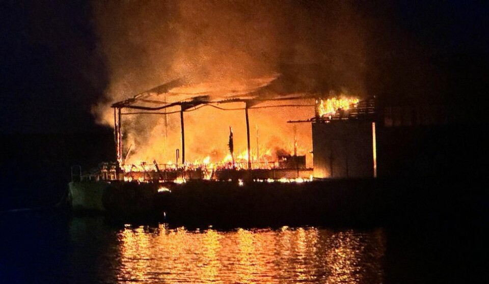 The feed barge on fire at Cooke's West Fara farm in January.