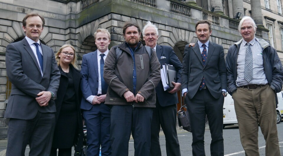 Don Staniford, centre, with his legal team after a Sheriff Appeal Court hearing in Edinburgh in February last year. The activist is now representing himself as he seeks to avoid paying nearly £83,000 in costs incurred by Mowi.