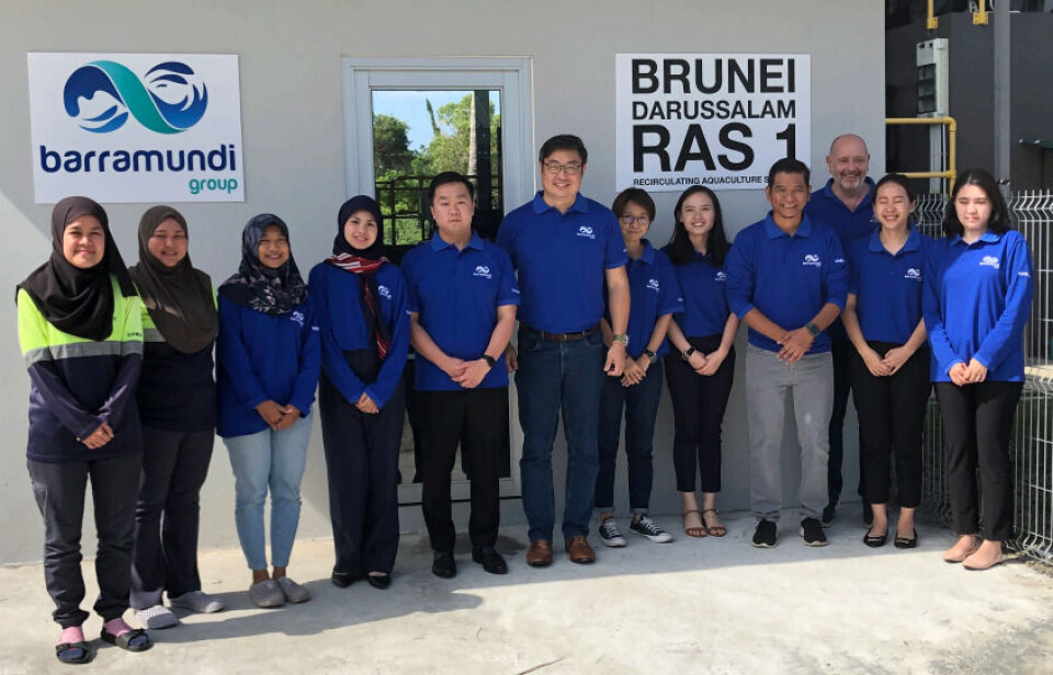 Barramundi Group chief executive James Kwan, sixth from left, with staff in Brunei.