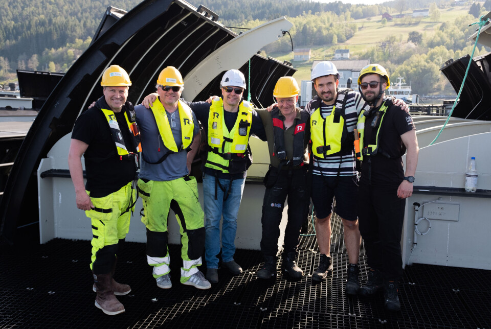 From left: Geir Andresen, Elg Thunes, Nils-Johan Tufte (all from Bluegreen), Johannes Schjølberg, Mykhaylo Ivashchenko, and Erlend Are Larsen (all from SalMar), at the first smolt stocking on Friday.