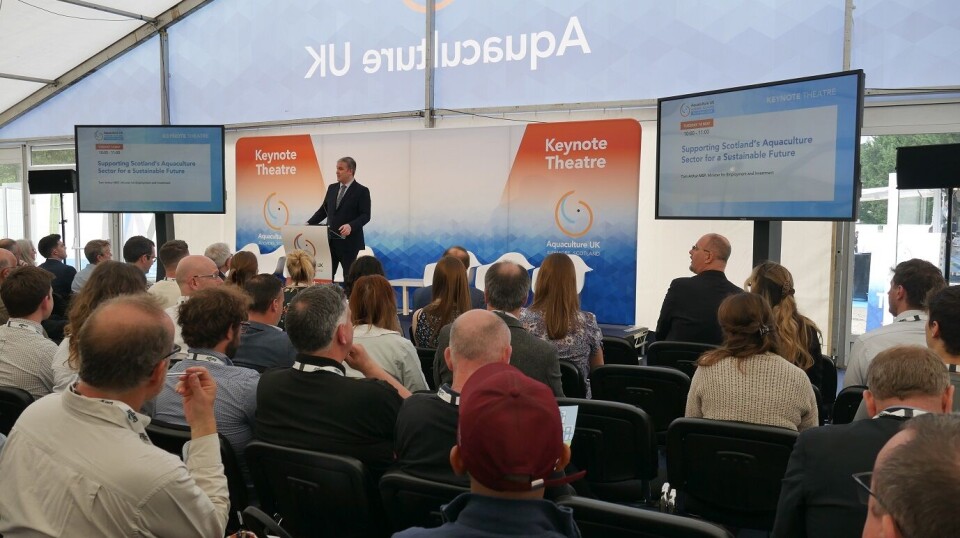 Tom Arthur addressing visitors to Aquaculture UK in Aviemore today.