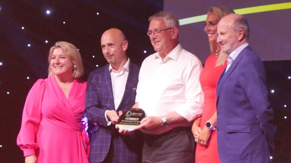 John Holmyard holding his Producer of the Year award.
