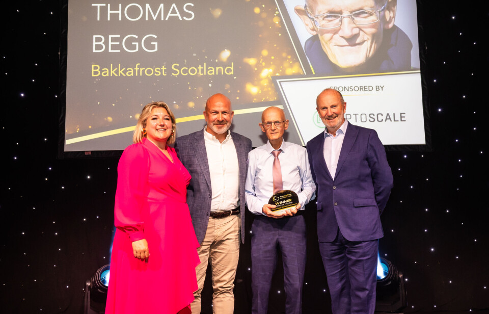 Thomas Begg with his trophy and, from left: Aquaculture UK chief Cheri Arvonio; Terje Vestad, international sales director for award category sponsor OptoScale; and awards show host Fred MacAulay.