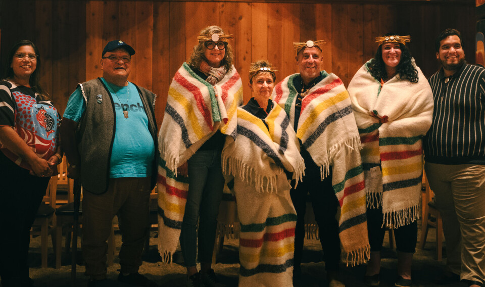Mowi Canada West managing director Diane Morrison, centre, pictured during a blanketing ceremony by the Kitasoo Xai'xais First Nation, which has an agreement with Mowi to allow salmon farming in its traditional territory in the remote Klemtu region, 500 miles north of Vamcouver. Mowi is now considering its future in the province. From left, Roxanne Robinson; Hereditary Chief Harvey Robinson; Susan Smith from Bluesky Strategy Group; Diane Morrison; former Mowi Scotland, Ireland and Canada communications director Ian Roberts; Katie Maximick, of the Coalition of First Nations for Finfish Stewardship; and Isaiah Robinson, chief executive of the Kitasoo Development Corporation.