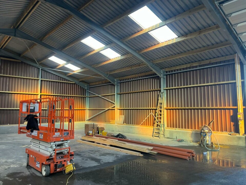 An interior view of the feed barge shed after the cladding was installed.
