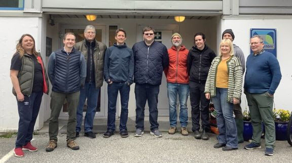 Researchers working with chemical signals in salmon, gathered for experiments at Austevoll. Aleksei Krasnov from Nofima is furthest to the right.