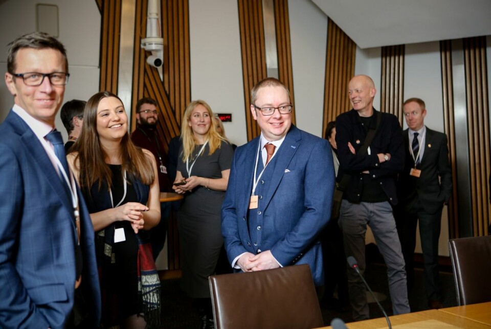 Salmon Scotland head of technical Iain Berrill, left, at the reception at Holyrood.