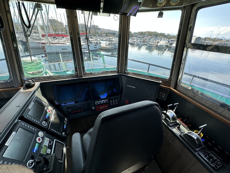 The starboard side of the wheelhouse, showing the skipper's seat and controls.